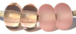 Pink Color Notes: very pale, leaning more towards peach 5x10 mm Available shapes and sizes:Round Bead Shapes: Available to order 8 to 15 mm with hole sizes ranging from 1.5 to 5 mm. See drop down menu for the exact options. Shown here in 8, 9 and 10 mm with both a 2.5 mm and 1.5 mm hole. 4 and 5 mm holes will fit European Charm style jewelry.Also available in a wavy disk or bead cap:. Pressed bead shapes:Lentil - 12x13 mm in size with a 1.5mm hole.: Pillow 13 mm square with a 1.5 mm hole.: Tab: Default Titl