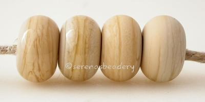 Sandstone Color Notes: streaky ivory 5x10 mm Available shapes and sizes:Round Bead Shapes: Available to order 8 to 15 mm with hole sizes ranging from 1.5 to 5 mm. See drop down menu for the exact options. Shown here in 8, 9 and 10 mm with both a 2.5 mm and 1.5 mm hole. 4 and 5 mm holes will fit European Charm style jewelry.Also available in a wavy disk or bead cap:. Pressed bead shapes:Lentil - 12x13 mm in size with a 1.5mm hole.: Pillow 13 mm square with a 1.5 mm hole.: Tab: Default Title